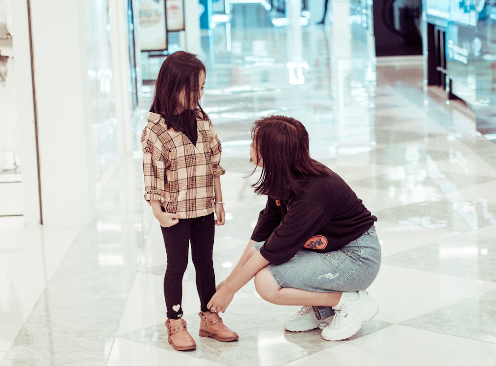 A dedicated teacher working with students at a community learning center